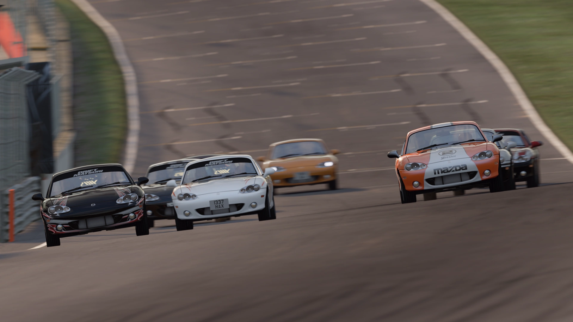 Spec Miatas NBFL racing at Brands Hatch