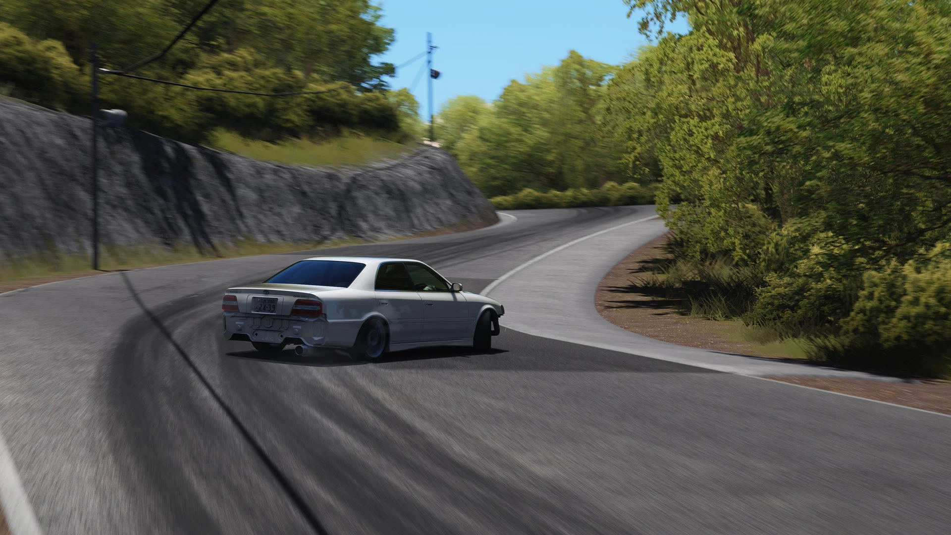 Toyota Chaser JZX100 drifting a section of Deriphill
